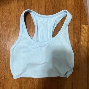 Two ribbed tank tops. Tried on once and too small.